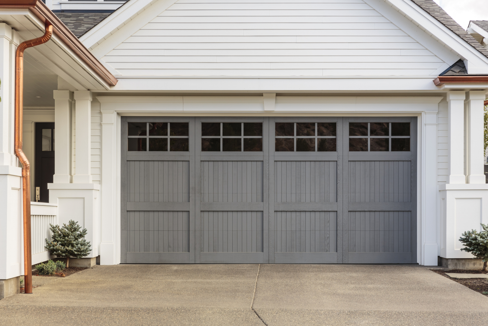 Gray garage door with bead board panels