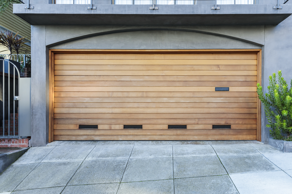 Why Homeowners Should Consider a Neutral Color Scheme for Their Garage Door