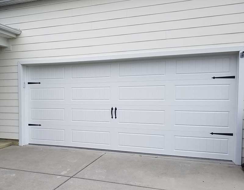 Why Homeowners Should Consider a Neutral Color Scheme for Their Garage Door