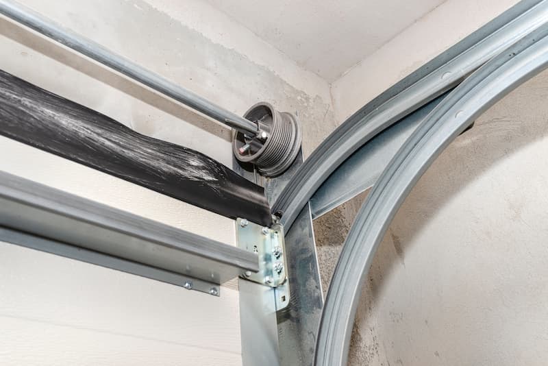 Garage door pulley and drum